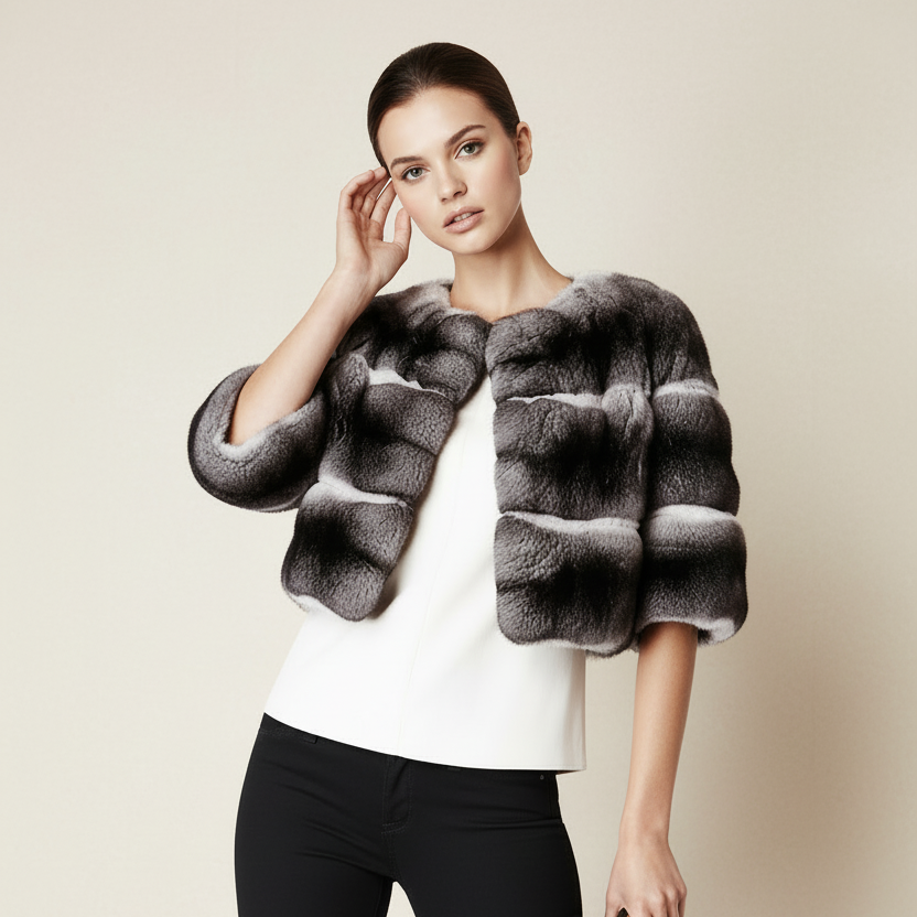 Woman wearing a fur vest over a white top and black pants on a beige background