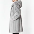 Gray hooded mink coat worn by a person on a white background